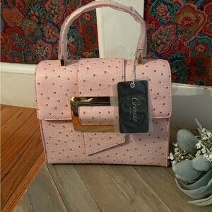 Crossi Stylish Pink Mini Bag with Gold Accent.